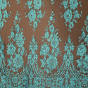 Calais lace turquoise on a brown background