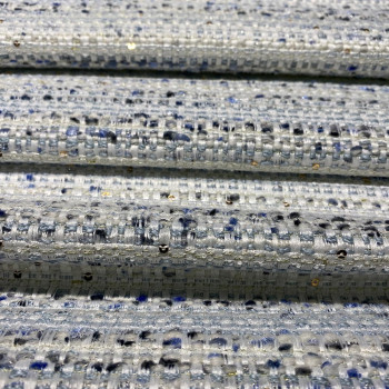 Woven and iridescent fabric with blue tweed and sequins