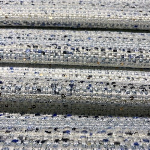 Tissu tissé et irisé effet tweed blanc bleu et paillettes