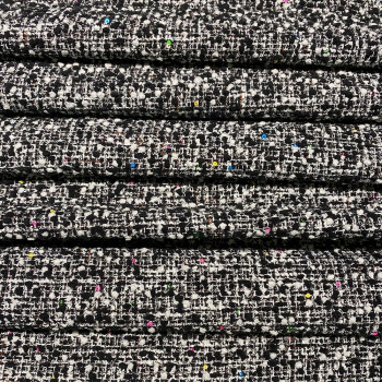 Woven and iridescent tweed fabric with black white checks and sequins