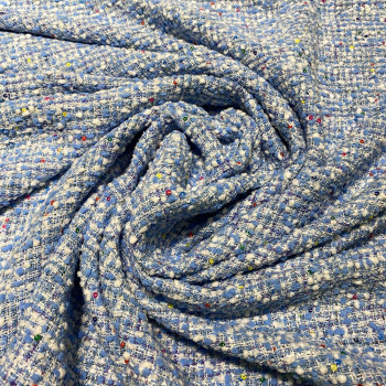 Woven and iridescent fabric with white sky blue tweed and sequins