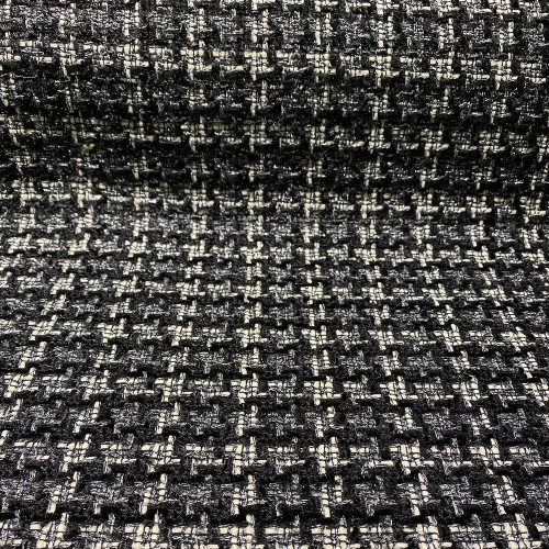 Woven and iridescent tweed fabric with black, white and silver checks