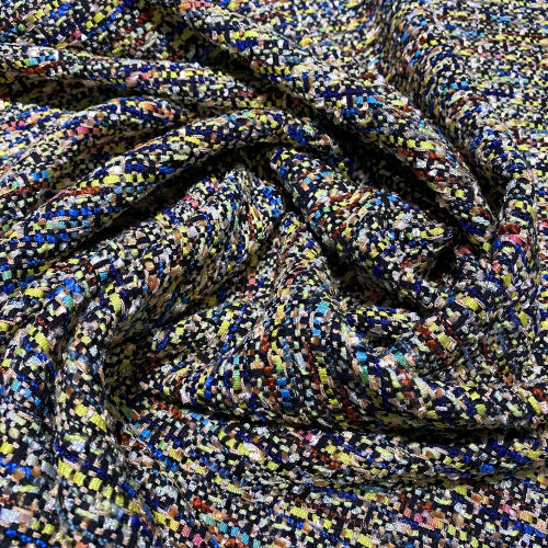 Woven and iridescent fabric tweed effect black gold background and pink multicolor