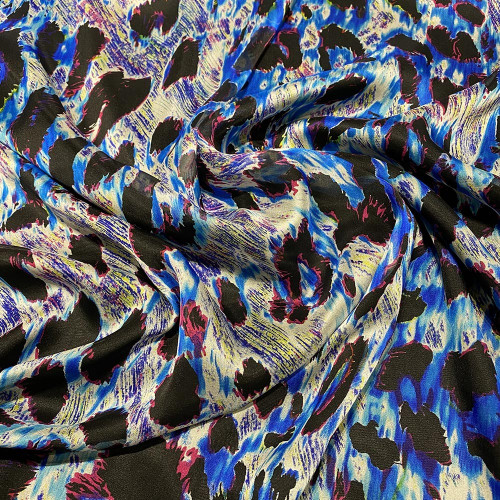 Tissu mousseline de soie imprimé panthère bleu et rouge