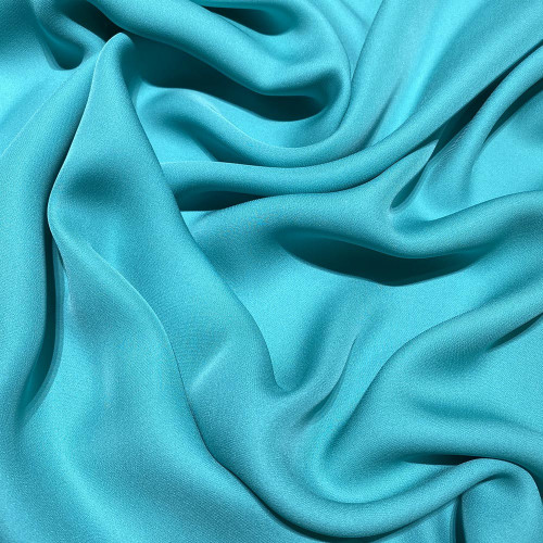 Opaline green fluid silk crepe dobby fabric