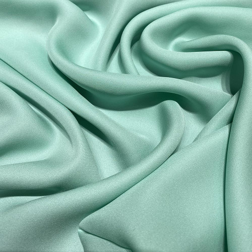 Nile green fluid silk crepe dobby fabric