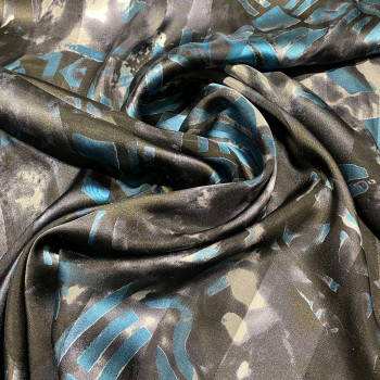 Tissu mousseline de soie imprimé bande satin motifs géométriques bleus