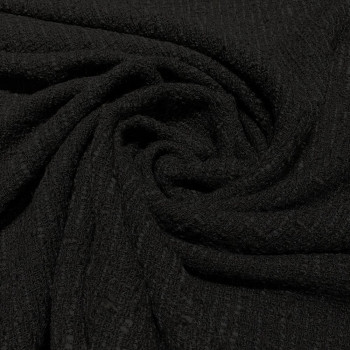 Tissu tissé et irisé effet tweed noir