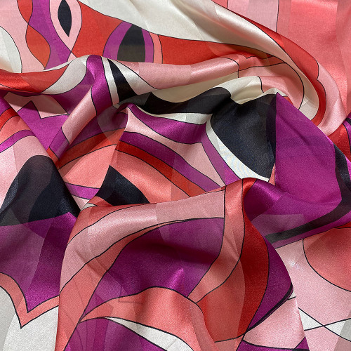 Tissu mousseline de soie avec bandes satin imprimé géométrique fuchsia et rose
