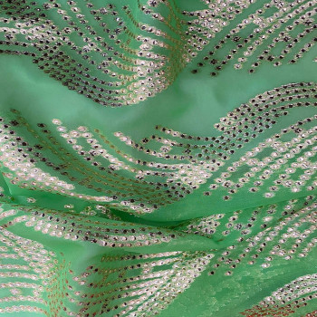Gold metallic silk jacquard on anise green chiffon background