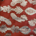 Gold metallic silk jacquard on coral chiffon background