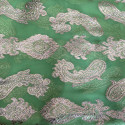 Gold metallic silk jacquard on anise green chiffon background