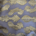 Gold metallic silk jacquard on a lilac chiffon background