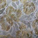 Calais lace gold/silver laminette on a ivory background