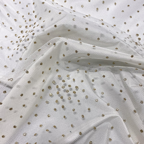 Sequined tulle with gold dots on ivory background