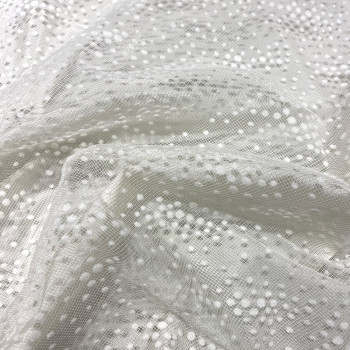 Sequined tulle with ivory discontinuous dots on ivory background