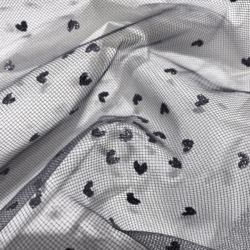Tulle pailleté cœurs gris anthracite sur tulle gris