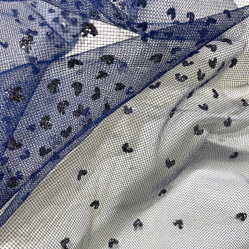 Sequined tulle with charcoal silver hearts on navy blue tulle