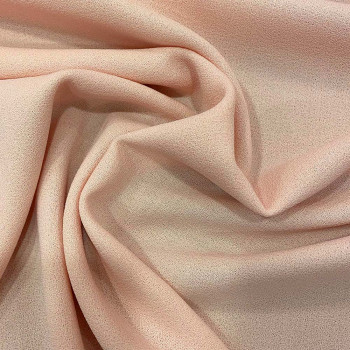 Tissu crêpe de laine 100% laine rose saumon