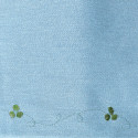Stretch denim blue denim fabric with green trefoil edge