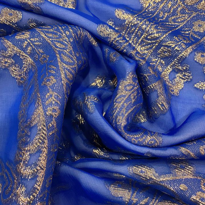 Gold metal silk jacquard fabric on royal blue chiffon