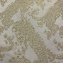 Gold metal silk jacquard fabric on ivory chiffon