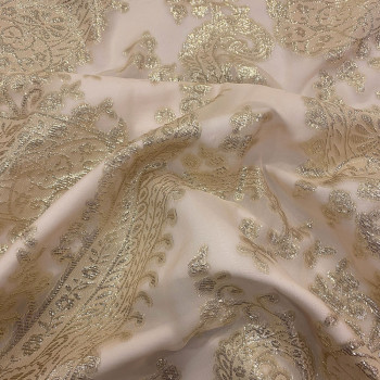 Gold metal silk jacquard fabric on nude chiffon