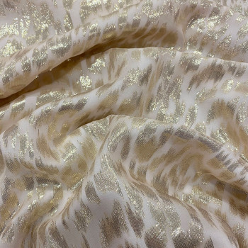 Gold metallic silk jacquard fabric on nude chiffon background