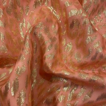 Gold metallic silk jacquard fabric on coral chiffon background