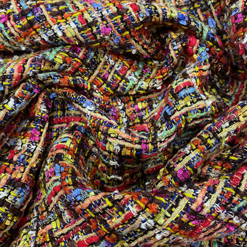 Woven and iridescent fabric with multicolored tweed effect
