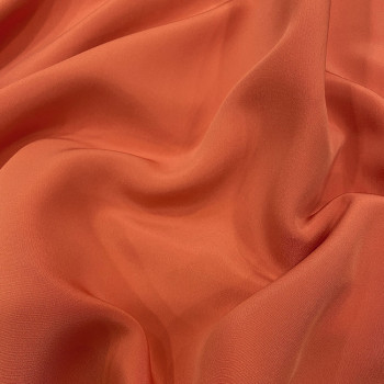 Tissu crêpe drap de soie orange abricot