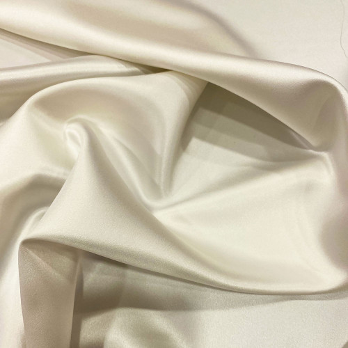 Tissu crêpe envers satin 100% soie blanc cassé