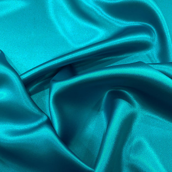 Tissu crêpe envers satin 100% soie bleu turquoise