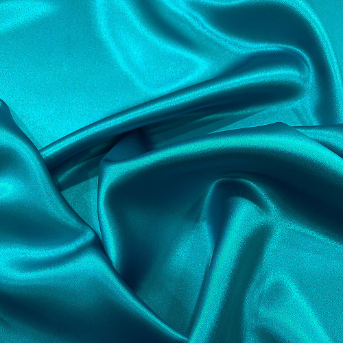 Tissu crêpe envers satin 100% soie bleu turquoise