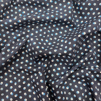 Cotton poplin fabric with sky blue polka dots on blue background