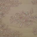 Pink beaded and embroidered tulle fabric