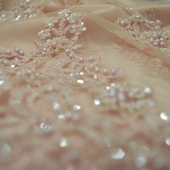 Pink beaded and embroidered tulle fabric