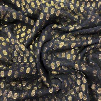 Lamé silk fabric with golden dots on dark blue background