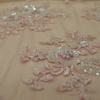 Pink beaded and embroidered tulle fabric