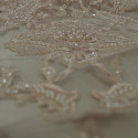 Peach beaded and embroidered tulle fabric