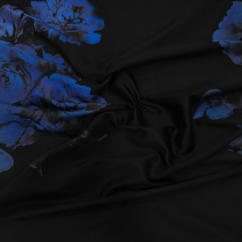 Jacquard fabric with dark royal blue floral pattern on midnight blue black background