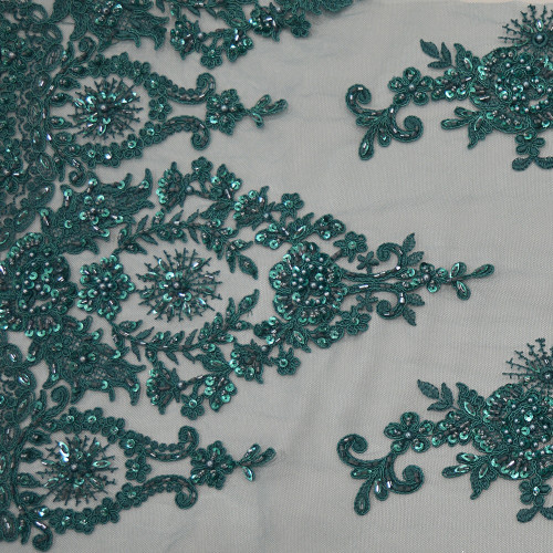 Blue beaded and embroidered tulle fabric