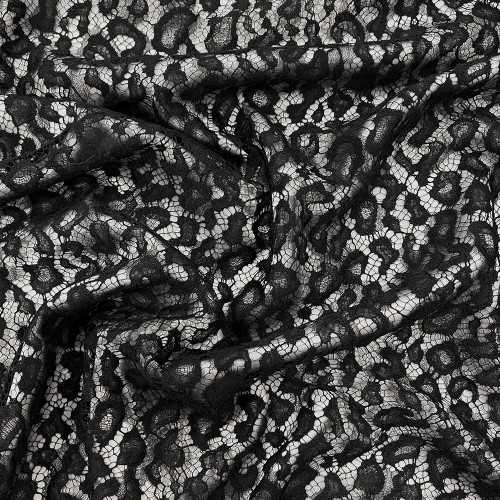 Calais lace with black leopard pattern — Tissus en Ligne