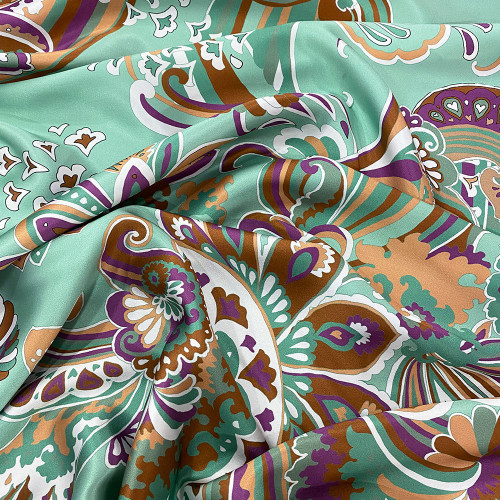 100% silk satin fabric with green, purple and brown floral paisley print