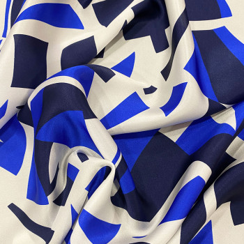 100% silk satin with blue geometric shapes print on white background