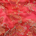 Coral embroidered tulle fabric