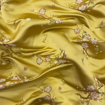 Satin jacquard fabric with yellow floral pattern