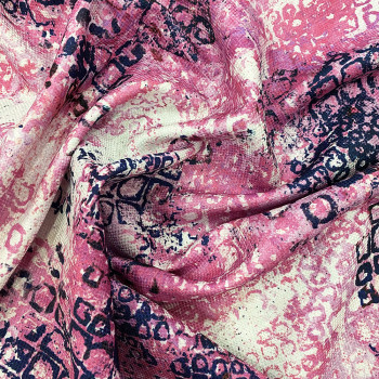 100% polyester piqué fabric with pink and blue print