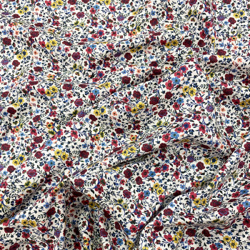 100% cotton poplin fabric with digital print multicolored flowers on white background