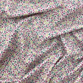 100% cotton poplin fabric with small fuchsia flowers on a white background digital print